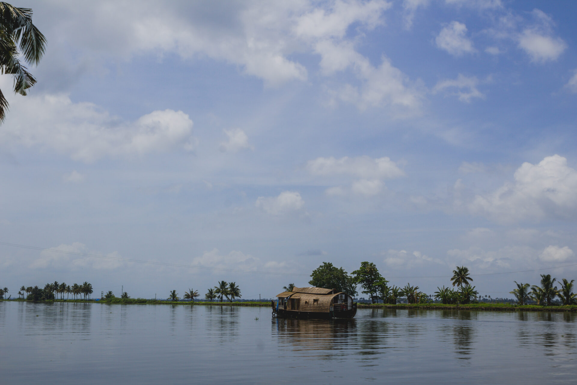 Moving house boat on a river