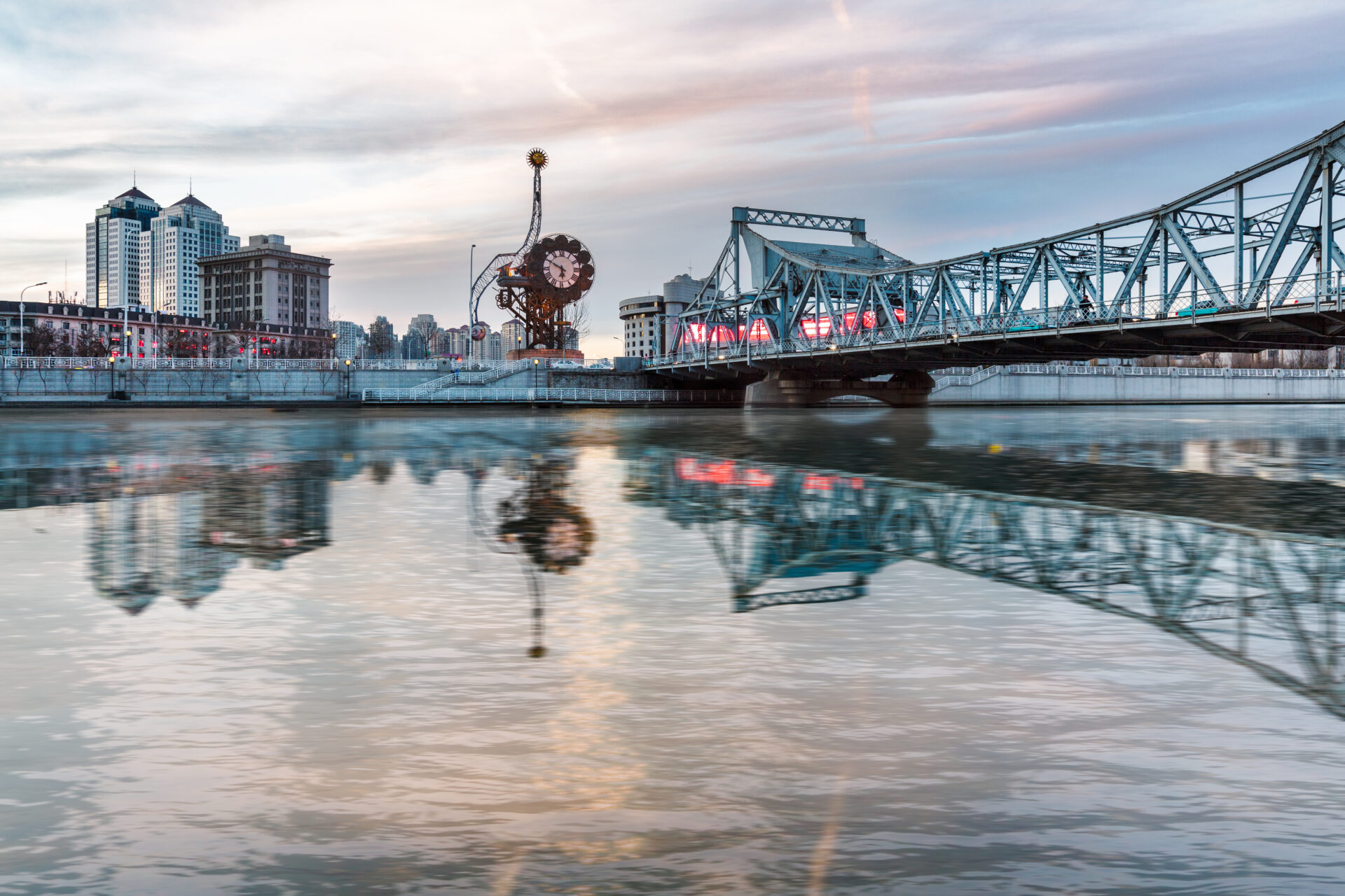 River And Modern Buildings Against Sky in Tianjin,China.