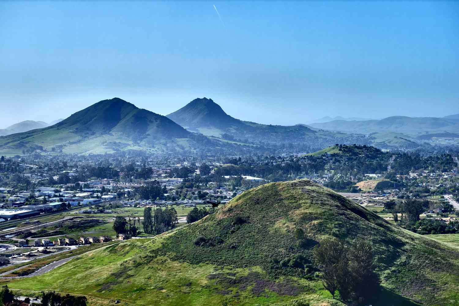 scenic-view-of-landscape-and-mountains-against-sky-1160032967-4114f904b7fc4560ad26125d17fc3212